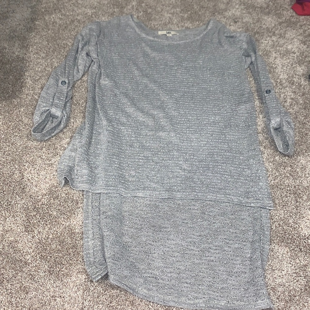Gray tunic.